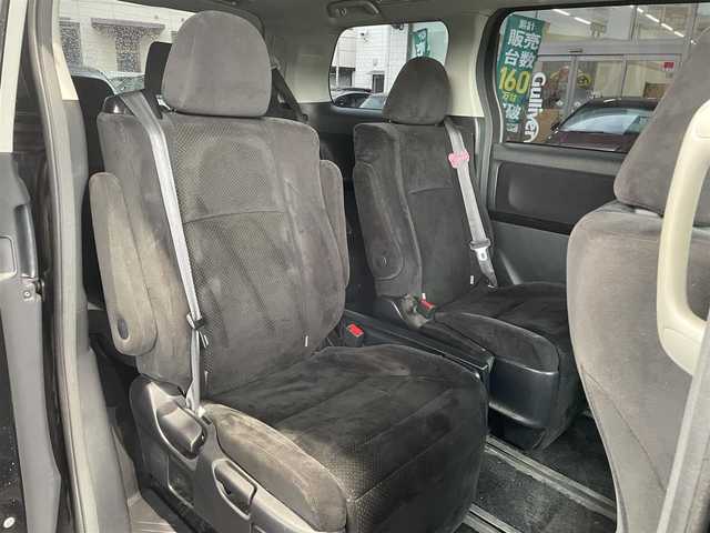 トヨタ ヴェルファイア 2．4Z プラチナセレⅡ ゴールド 岡山県 2011(平23)年 10.8万km ブラック 登録時走行距離107601km/フリップダウン後席モニター/社外SDナビ/(AM/FM/DISC/TV/BT)/クルーズコントロール/両側パワースライドドア/電動リアゲート/ビルトインETC/バックカメラ/ウォークスルー/MTモード付AT/プッシュスタート/スマートキー/スペアキー/純正１８インチアルミホイール/キセノンヘッドライト