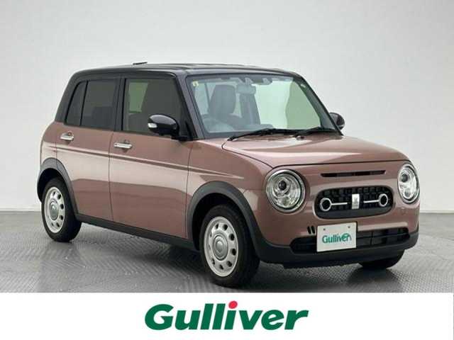 スズキ ラパン ＬＣ X 兵庫県 2023(令5)年 0.6万km テラコッタピンクメタリック/アーバンブラウン 2トーン ・全方位モニター用カメラパッケージ/・コーナーセンサー/・レーンキープアシスト/・アイドリングストップ/・オートライト/・LED ライト/・シートヒーター/・ハーフレザー/・スマートキー/・スペアキー×１/・純正１４インチAW