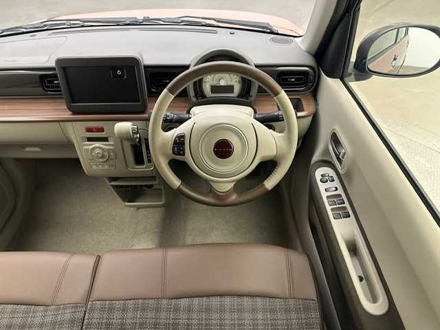 スズキ ラパン ＬＣ X 兵庫県 2023(令5)年 0.6万km テラコッタピンクメタリック/アーバンブラウン 2トーン ・全方位モニター用カメラパッケージ/・コーナーセンサー/・レーンキープアシスト/・アイドリングストップ/・オートライト/・LED ライト/・シートヒーター/・ハーフレザー/・スマートキー/・スペアキー×１/・純正１４インチAW