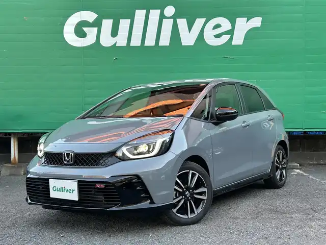 ホンダ フィット RS 東京都 2025(令7)年 0.1万km グレー ワンオーナー/ホンダコネクトディスプレイ/・９インチワイドディスプレイ/・フルセグTV/Bluetooth/applecarplay/androidauto/・ETC2.0/・3ビュー切替式リアワイドカメラ/・ステアリングスイッチ/ホンダセンシング/・衝突軽減ブレーキ/・アダクティブクルーズコントロール/・オートハイビーム/・車線維持支援システム/・トラフィックジャムアシスト/・パーキングセンサーシステム/マルチインフォメーションディスプレイ/保証書/取扱説明書
