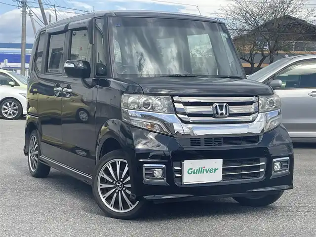 ホンダ Ｎ ＢＯＸ カスタム G ターボ Lパッケージ 群馬県 2015(平27)年 5.7万km スマートブラック ワンオーナー/４WD/社外メモリナビ、地デジ、Bluetooth、CD、DVD/　（NX-615）/バックカメラ/クルーズコントロール/革巻きステア/パドルシフト/ハーフレザーシート/前席シートヒーター/スマートキー×２/ETC/HIDヘッドライト/ウインカーミラー/両側パワースライドドア/ドアバイザー/整備手帳、取説