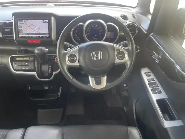 ホンダ Ｎ ＢＯＸ カスタム G ターボ Lパッケージ 群馬県 2015(平27)年 5.7万km スマートブラック ワンオーナー/４WD/社外メモリナビ、地デジ、Bluetooth、CD、DVD/　（NX-615）/バックカメラ/クルーズコントロール/革巻きステア/パドルシフト/ハーフレザーシート/前席シートヒーター/スマートキー×２/ETC/HIDヘッドライト/ウインカーミラー/両側パワースライドドア/ドアバイザー/整備手帳、取説