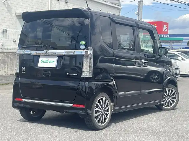 ホンダ Ｎ ＢＯＸ カスタム G ターボ Lパッケージ 群馬県 2015(平27)年 5.7万km スマートブラック ワンオーナー/４WD/社外メモリナビ、地デジ、Bluetooth、CD、DVD/　（NX-615）/バックカメラ/クルーズコントロール/革巻きステア/パドルシフト/ハーフレザーシート/前席シートヒーター/スマートキー×２/ETC/HIDヘッドライト/ウインカーミラー/両側パワースライドドア/ドアバイザー/整備手帳、取説