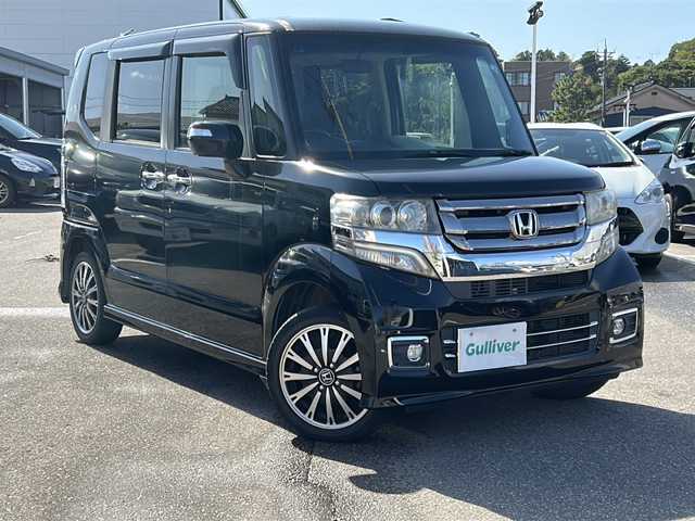 ホンダ Ｎ ＢＯＸ カスタム G ターボ Lパッケージ 石川県 2015(平27)年 5.7万km スマートブラック ４WD/ワンオーナー/社外SDナビゲーション/【Bluetooth・フルセグ・CD・DVD・SD】/バックカメラ/クルーズコントロール/ステアリングリモコン/・革巻きステア/・パドルシフト/・クルーズコントロール/ハーフレザーシート/前席シートヒーター/ETC/HIDヘッドライト/・オートライト/・フォグランプ/両側パワースライドドア/ドアバイザー/保証書/取扱説明書