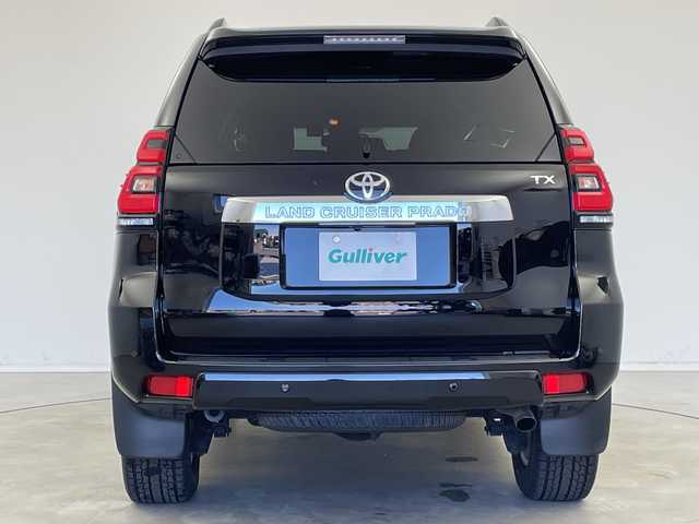 トヨタ ランドクルーザー プラド TX 新潟県 2022(令4)年 2.9万km ブラック 7人乗り/ディーゼル車/プリクラッシュセーフティ/レーダークルーズコントロール/レーンキープアシスト/クリアランスソナー/パーキングサポートブレーキ/ALPINEナビ（X9NX）/バックカメラ/フルセグTV/Bluetooth/USB/HDMI接続/ETC/ドライブレコーダー/センターデフロック/ダウンヒルアシスト/革調シートカバー/オートライト/オートハイビーム/LEDヘッドライト/ステアイングスイッチ/オートドアミラー/純正フロアマット/ドアバイザー