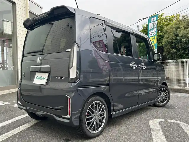 ホンダ Ｎ ＢＯＸ カスタム ターボ 埼玉県 2024(令6)年 0.1万km メテオロイドグレーメタリック ワンオーナー/ハーフレザーシート/純正SDナビ/　DTV/CD/DVD/BT/USB/　Apple CarPlay/Honda SENSING/　・アダプティブクルーズコントロール/　・近距離衝突軽減ブレーキ/　・急アクセル抑制機能/　・車線維持支援システム(LKAS)/　・オートハイビーム/両側パワースライドドア/純正ナビ連動ETC2.0/(DTH-203M）/純正ナビ連動前後ドライブレコーダー/(DRH-229ND)/フロントシートヒーター/リヤデフロスター/ヒーテッドドアミラースイッチ/アイドリングストップ/ソナーセンサー/パドルシフト/緊急通報ボタン/横滑り防止装置/純正フロアマット/スマートキー/スペアキー/保証書/取説/記録簿