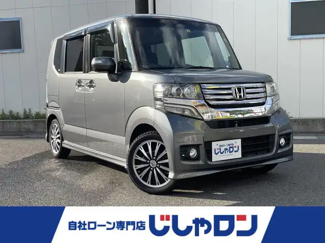 ホンダ Ｎ ＢＯＸ カスタム G ターボパッケージ 福島県 2012(平24)年 9万km ポリッシュドメタルメタリック (株)IDOMが運営する【じしゃロン福島店】の自社ローン専用車両になります。こちらは現金またはオートローンご利用時の価格です。自社ローンご希望の方は別途その旨お申付け下さい/純正ナビ（AM/FM/CD/DVD/BT)/フルセグテレビ/両側パワースライドドア/クルーズコントロール/ETC/ステアリングスイッチ/パドルシフト/純正15インチアルミホイール/横滑り防止装置