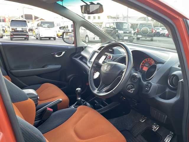 ホンダ フィット RS 山口県 2011(平23)年 10.5万km サンセットオレンジⅡ 6速マニュアル車/純正HDDナビ/CD/DVD/Bluetooth/フルセグテレビ/ETC/保証書/取扱説明書/記録簿/HIDヘッドライト/フォグライト/オートライト/オートエアコン/社外フロアマット/リモコンキー/スペアキー/純正16インチアルミホイール/前後ドライブレコーダー/電動格納ミラー