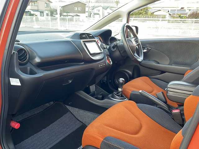 ホンダ フィット RS 山口県 2011(平23)年 10.5万km サンセットオレンジⅡ 6速マニュアル車/純正HDDナビ/CD/DVD/Bluetooth/フルセグテレビ/ETC/保証書/取扱説明書/記録簿/HIDヘッドライト/フォグライト/オートライト/オートエアコン/社外フロアマット/リモコンキー/スペアキー/純正16インチアルミホイール/前後ドライブレコーダー/電動格納ミラー