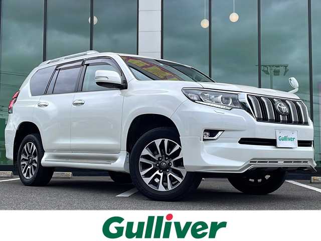 トヨタ ランドクルーザー プラド TX Lパッケージ 福岡県 2023(令5)年 2.9万km ホワイトパールクリスタルシャイン ・ワンオーナー/・純正エアロパーツ/・サンルーフ/・ブラックレザーシート/・アルパイン製９型ナビ/・アルパイン製デジタルインナーミラー/・アルパイン製ドライブレコーダー/・純正オプションウッドコンビハンドル/・純正オプションウッドコンビシフトノブ/・ウッド調パネル/・バックカメラ/・７人乗り/・シートヒーター/・エアシート/・パワーシート/・純正１９インチアルミホイル/・ルーフレール/・ドアバイザー/・フロアマット/・スマートキー/・保証書/・取扱説明書