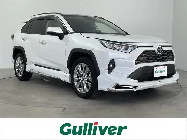 トヨタ ＲＡＶ４ G Zパッケージ 大分県 2023(令5)年 3.1万km プラチナホワイトパールマイカ 純正ナビ/Bluetooth/フルセグ/Miracast/モデリスタエアロ/サンルーフ/レーダークルコン/シートヒーター・クーラー（D＋N）/シートメモリー/アラウンドビューモニター/全方位カメラ/パワーシート/純正アルミホイル19インチ/純正フロアマット/電動リアゲート/オートライト/オートマチックハイビーム/オートブレーキホールド/ステアリングヒーター/革巻ステアリング/ステアリングスイッチ/ビルトインETC2.0