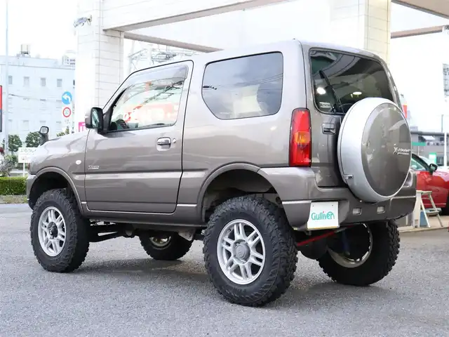 スズキ ジムニー クロスアドベンチャー 神奈川県 2013(平25)年 5.1万km ガイアブロンズPM 2インチリフトアップ/YOKOHAMA GEOLANDER M/TG003/：6.50R16 LT97/93Q6PR/シートヒーター（前席）/ETC/純正フロアマット/電動格納ミラー/：ヒーター/レッドステッチ革巻きステアリングホイール