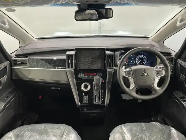 三菱 デリカＤ：５ シャモニー 愛知県 2025(令7)年 0.1万km未満 白Ⅱ 登録済未使用車/オリジナルナビ取付パッケージ＋リアモニター取付パッケージ/衝突軽減ブレーキ/両側電動スライドドア/アラウンドビューモニター/レーダークルーズコントロール/１００V電源/シートヒーター/LEDヘッドライト/ブラインドスポットモニター/ステアリングヒーター/電動パワーシート/電動リアゲード/レーンキープアシスト/オートハイビーム/アイドリングストップ/パドルシフト