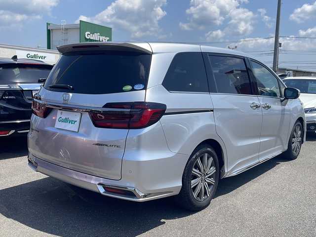ホンダ オデッセイ アブソルート 茨城県 2021(令3)年 3.2万km スーパープラチナメタリック 純正SDナビ＆地デジTV/(地デジTV・CD・DVD・BT・ラジオ再生)/社外ドライブレコーダー（フロント・リヤ）/純正後席モニター/純正ETC/被害軽減システム/プッシュスタート/バックカメラ（全方位）/アイドリングストップ/サイドエアバック/両側パワースライドドア/取扱説明書/保証書