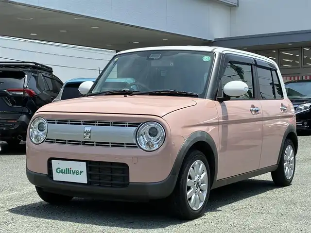 スズキ ラパン X 熊本県 2020(令2)年 3.7万km コフレピンクパールメタリック/ホワイト2トーンルーフ 純正SDナビ(CN-RZ753W)/【フルセグTV/CD/DVD/SD/USB/Bluetooth】/全方位カメラ/衝突被害軽減システム/レーンキープアシスト/コーナーセンサー(後ろ)/D席シートヒーター/純正14インチアルミホイール/オートライト/オートマチックハイビーム/ビルトインETC/アイドリングストップ/横滑り防止装置/盗難防止装置/純正フロアマット/プッシュスタート/スマートキー/スペアキー/取扱説明書/保証書