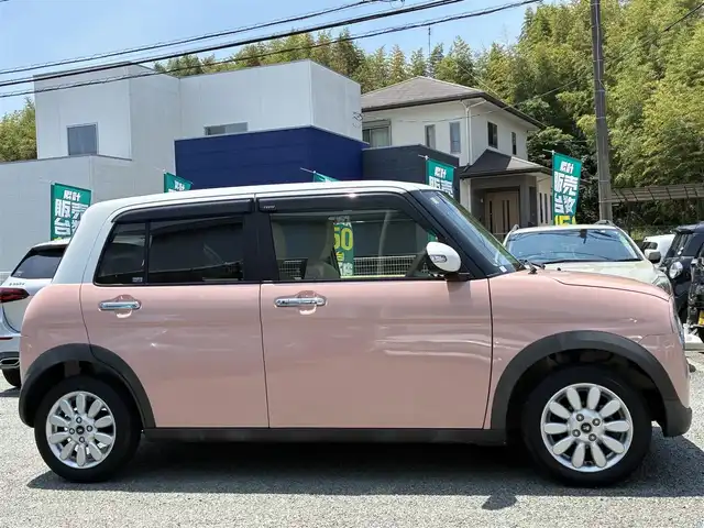スズキ ラパン X 熊本県 2020(令2)年 3.7万km コフレピンクパールメタリック/ホワイト2トーンルーフ 純正SDナビ(CN-RZ753W)/【フルセグTV/CD/DVD/SD/USB/Bluetooth】/全方位カメラ/衝突被害軽減システム/レーンキープアシスト/コーナーセンサー(後ろ)/D席シートヒーター/純正14インチアルミホイール/オートライト/オートマチックハイビーム/ビルトインETC/アイドリングストップ/横滑り防止装置/盗難防止装置/純正フロアマット/プッシュスタート/スマートキー/スペアキー/取扱説明書/保証書