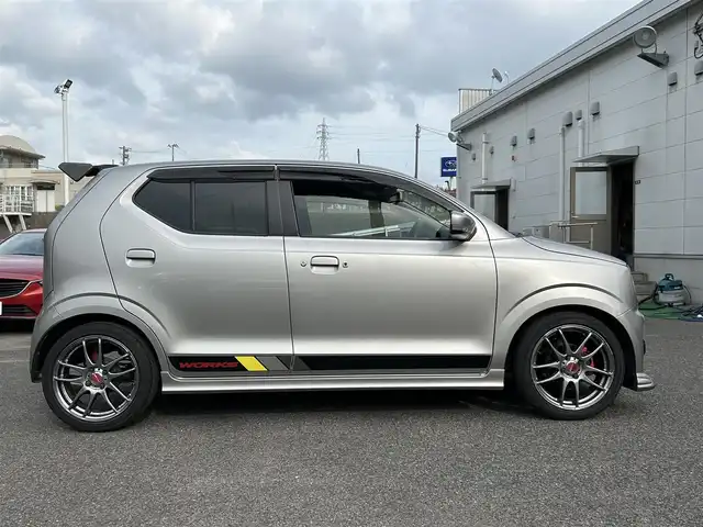 スズキ アルト ワークス 長崎県 2017(平29)年 4.2万km スチールシルバーM 社外SDナビ(Bluetooth/DISC/TV/FM/AM)/プッシュスタート/バックカメラ/スマートキー/オートライト/ビルトインETC/電動格納ミラー/保証書/取説/スペアキー/WORK16インチアルミホイール/FUJITSUBOマフラー(RIVID)/MONSTER SPORTエアロ(フロント/ウィンドウバイザー/GTウィング/サスペンション)/純正RECAROシート