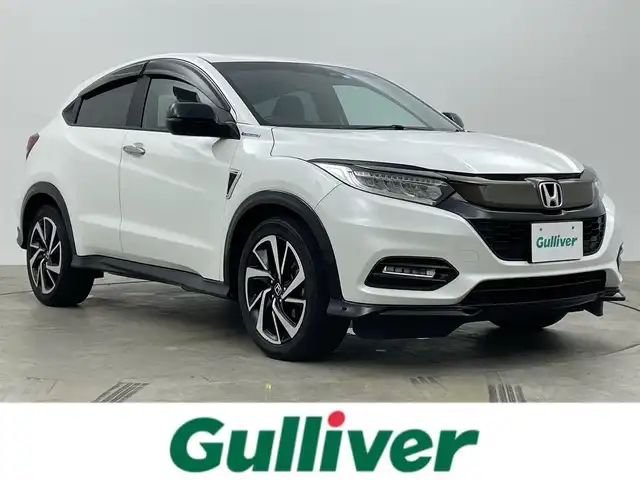 ホンダ ヴェゼル ハイブリッド RS ホンダセンシング 岡山県 2020(令2)年 5.9万km プラチナホワイトパール 純正８インチナビ/（フルセグ/Bluetooth/Carplay/HDMI/CD/DVD)/衝突軽減ブレーキ/ハーフレザー（合皮）/レーダークルーズコントロール/ビルトインＥＴＣ/シートヒーター/ＬＥＤヘッドライト/フォグランプ/バックカメラ/プッシュスタート/スマートキー×2/取扱説明書