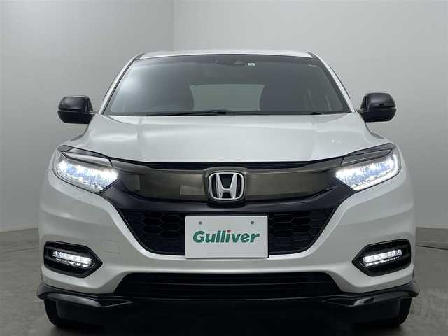 ホンダ ヴェゼル ハイブリッド RS ホンダセンシング 岡山県 2020(令2)年 5.9万km プラチナホワイトパール 純正８インチナビ/（フルセグ/Bluetooth/Carplay/HDMI/CD/DVD)/衝突軽減ブレーキ/ハーフレザー（合皮）/レーダークルーズコントロール/ビルトインＥＴＣ/シートヒーター/ＬＥＤヘッドライト/フォグランプ/バックカメラ/プッシュスタート/スマートキー×2/取扱説明書