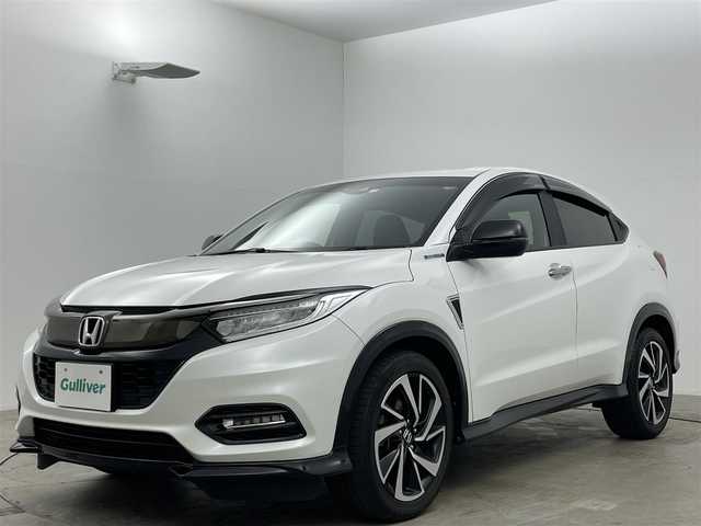 ホンダ ヴェゼル ハイブリッド RS ホンダセンシング 岡山県 2020(令2)年 5.9万km プラチナホワイトパール 純正８インチナビ/（フルセグ/Bluetooth/Carplay/HDMI/CD/DVD)/衝突軽減ブレーキ/ハーフレザー（合皮）/レーダークルーズコントロール/ビルトインＥＴＣ/シートヒーター/ＬＥＤヘッドライト/フォグランプ/バックカメラ/プッシュスタート/スマートキー×2/取扱説明書
