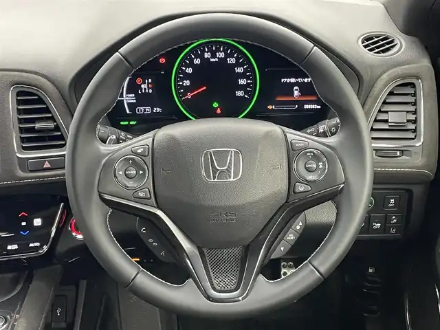 ホンダ ヴェゼル ハイブリッド RS ホンダセンシング 岡山県 2020(令2)年 5.9万km プラチナホワイトパール 純正８インチナビ/（フルセグ/Bluetooth/Carplay/HDMI/CD/DVD)/衝突軽減ブレーキ/ハーフレザー（合皮）/レーダークルーズコントロール/ビルトインＥＴＣ/シートヒーター/ＬＥＤヘッドライト/フォグランプ/バックカメラ/プッシュスタート/スマートキー×2/取扱説明書