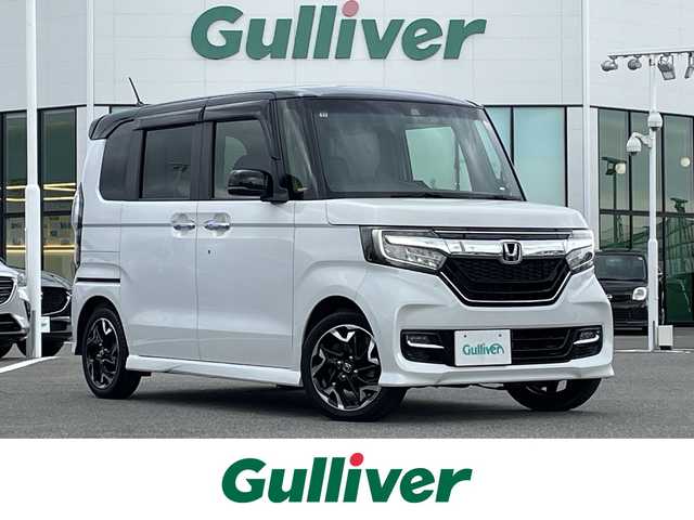 ホンダ Ｎ ＢＯＸ カスタム G L ターボ ホンダセンシング 佐賀県 2018(平30)年 5万km プラチナホワイトパール ワンオーナー/純正8インチSDナビゲーション/・フルセグTV/CD/DVD/SD/USB/Bluetooth/バックカメラ/前後ドライブレコーダー/ビルトインETC/両側パワースライドドア/オーバーヘッドコンソール/ハーフレザーシート/後席サンシェード/ISOFIX対応/パドルシフト/革巻きステアリング/ステアリングリモコン/純正15インチアルミホイール/純正LEDヘッドライト/・オートマチックハイビーム/純正LEDフォグランプ/純正フロアマット/純正ドアバイザ―/取扱説明書/スペアキー１本/ホンダセンシング/・アダプディブクルーズコントロール/・衝突被害軽減ブレーキ/・先行車発進お知らせ機能/・路外逸脱抑制機能/・標識認識機能