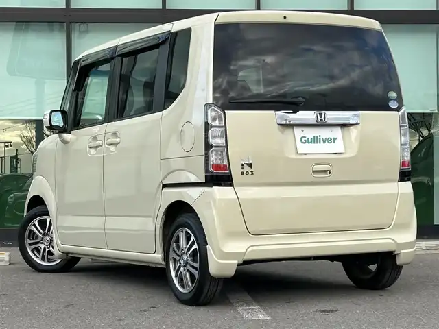 ホンダ Ｎ ＢＯＸ G ターボパッケージ 和歌山県 2013(平25)年 5.2万km ヒダマリアイボリーパール 純正ナビ/バックカメラ/両側パワースライドドア/横滑り防止装置/クルーズコントロール/パドルシフト/純正アルミホイール/電動格納ミラー/ECON/シガーソケット/ヘッドライトレベライザー/ハロゲンヘッドライト