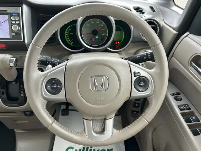 ホンダ Ｎ ＢＯＸ G ターボパッケージ 和歌山県 2013(平25)年 5.2万km ヒダマリアイボリーパール 純正ナビ/バックカメラ/両側パワースライドドア/横滑り防止装置/クルーズコントロール/パドルシフト/純正アルミホイール/電動格納ミラー/ECON/シガーソケット/ヘッドライトレベライザー/ハロゲンヘッドライト