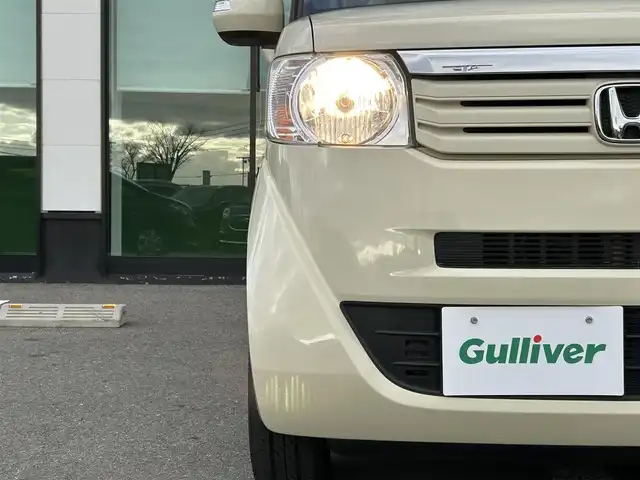 ホンダ Ｎ ＢＯＸ G ターボパッケージ 和歌山県 2013(平25)年 5.2万km ヒダマリアイボリーパール 純正ナビ/バックカメラ/両側パワースライドドア/横滑り防止装置/クルーズコントロール/パドルシフト/純正アルミホイール/電動格納ミラー/ECON/シガーソケット/ヘッドライトレベライザー/ハロゲンヘッドライト