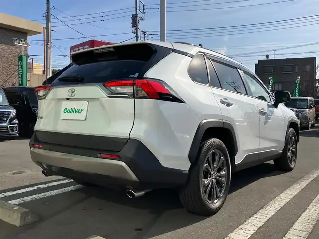 トヨタ ＲＡＶ４ G 静岡県 2023(令5)年 1.5万km プラチナホワイトパールマイカ エンジンスタートボタン/スマートキー/パワーウィンドウ/パワーステアリング/４WD/Wオートエアコン/１００V充電/クルーズコントロール/USB入力端子/ETC2/0/全方位カメラ/純正ナビ（BT.フルセグ）/電動リアゲート/純正フロアマット/D席パワーシート/D席N席シートヒーター/ルーフレール/純正アルミホイール/ABS/横滑り防止装置/盗難防止装置/オートライト/オートマチックハイビーム/コーナーセンサー/LEDヘッドライト/W+サイドエアバック/衝突軽減システム/カーテンエアバック