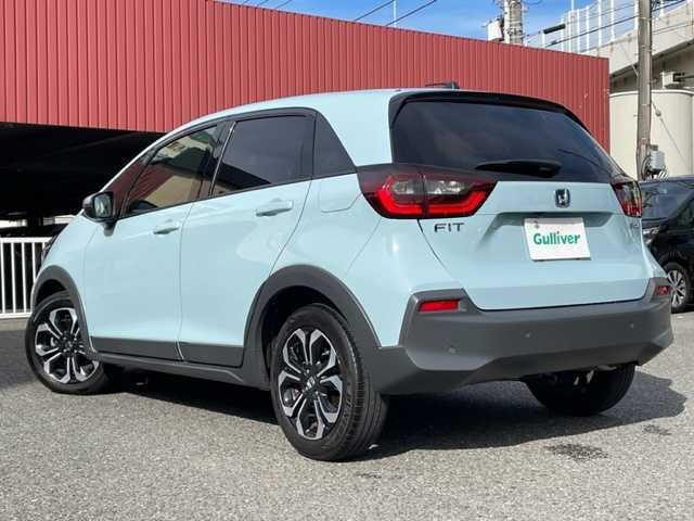 ホンダ フィット e:HEVクロスター 神奈川県 2022(令4)年 2.7万km サーフブルー ワンオーナー/純正メモリーナビ【VXM-225Ci】/・CD/ラジオ/USB/Bluetooth/バックカメラ/クリアランスソナー/ホンダセンシング/・衝突軽減ブレーキ/・踏み間違い衝突軽減システム/・歩行者事故低減ステアリング/・アダプティブクルーズコントロール/・車線維持支援システム/・路外逸脱抑制機能/・先行車発進お知らせ機能/・標識認識機能/ドライブレコーダー/ビルトインETC/純正16インチAW/純正LEDヘッドライト/ヘッドライトレベライザー/D席シートリフター/プッシュEgスタート/ストップ/スマートキー×2/ターンランプ付電動格納ドアミラー/純正フロアマット/取扱説明書/ナビ取扱説明書/新車時保証書