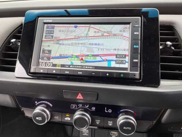 ホンダ フィット e:HEVクロスター 神奈川県 2022(令4)年 2.7万km サーフブルー ワンオーナー/純正メモリーナビ【VXM-225Ci】/・CD/ラジオ/USB/Bluetooth/バックカメラ/クリアランスソナー/ホンダセンシング/・衝突軽減ブレーキ/・踏み間違い衝突軽減システム/・歩行者事故低減ステアリング/・アダプティブクルーズコントロール/・車線維持支援システム/・路外逸脱抑制機能/・先行車発進お知らせ機能/・標識認識機能/ドライブレコーダー/ビルトインETC/純正16インチAW/純正LEDヘッドライト/ヘッドライトレベライザー/D席シートリフター/プッシュEgスタート/ストップ/スマートキー×2/ターンランプ付電動格納ドアミラー/純正フロアマット/取扱説明書/ナビ取扱説明書/新車時保証書