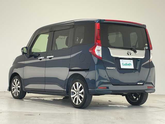 トヨタ ルーミー カスタムG－T 愛知県 2018(平30)年 1.5万km レーザーブルークリスタルシャイン 純正ナビ/両側パワースライドドア/クルーズコントロール/バックカメラ/コーナーセンサー/純正アルミホイール/LEDヘッドライト/レーンキープアシスト/ドライブレコーダー/ETC/衝突軽減システム/フルセグ/CD DVD/Bluetooth/ステアリングスイッチ/スマートキー/プッシュスタート