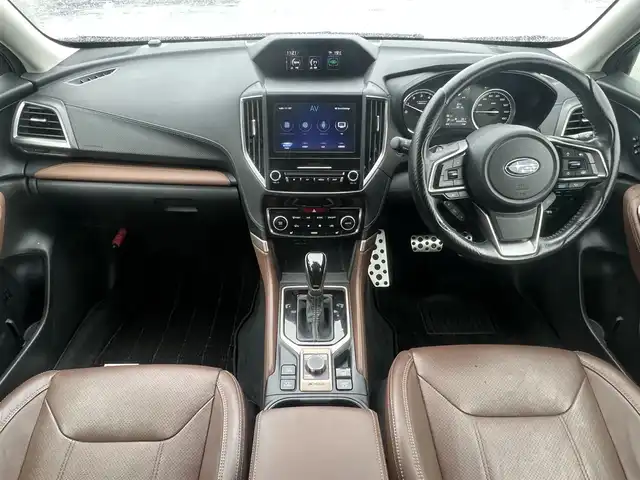 スバル フォレスター ハイブリッド アドバンス 秋田県 2019(平31)年 6.4万km クリスタルホワイトP ４WD/衝突軽減システム/LEDヘッドライト/本革レザーシート/純正メモリナビ/フルセグ/バック/フロント/サイドカメラ/純正アルミ/スマートキー/アイドリングストップ/プッシュスタート/クルーズコントロール追従走行有/コーナーセンサー/レーンキープアシスト/ステアリングスイッチ/ステアリングヒーター/パドルシフト/ドライブレコーダー/全席シートヒーター/前席パワーシート/メモリー付パワーシート/ETC/デジタルインナーミラー/電動リアゲート/電動パーキングブレーキ/ブラインドスポットモニター/インテリジェントAFS/純正フロアマット/純正ドアバイザー/オートライト/オートエアコン/パワーステアリング/パワーウィンドウ/ヘッドライトレベライザー/キーレスエントリー/横滑り防止/盗難防止装置/寒冷地仕様/電動格納ウィンカーミラー/保証書/取扱説明書/記録簿