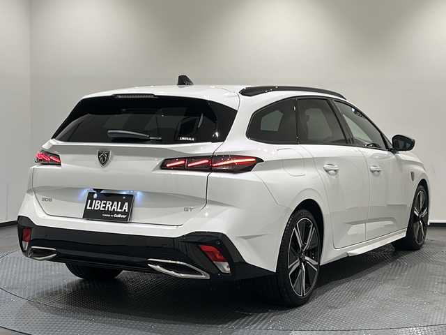 プジョー プジョー ３０８ SW GT ブルーHDi 新潟県 2023(令5)年 0.6万km ビアンカホワイト GTBlueHDI標準装備/パノラミックサンルーフ（メッシュシェード付） /スポーティフロントグリル/フロントフェンダーライオンエンブレム/フロント＆サイドスカート /マトリックスLEDヘッドライト/リア3D LEDコンビネーションランプ /ハンズフリーテールゲート/ルーフレール/レーンポジショニングアシスト /360°ビジョン（4カメラ） /フロントシートヒーター/ステアリングヒーター/運転席パワーシート（メモリー付）/フロントマルチポイントランバーサポート/アルカンタラテップレザーシート /アルカンタラダッシュボードデコレーション /ブラックルーフライニング/ドライブモードセレクター/PEUGEOT i-Connect Advanced・10インチ/クリーンキャビン/アルミペダル/フロントドアステップガード/18インチアロイホイール