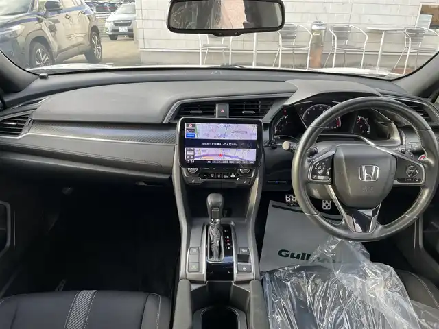 ホンダ シビック ハッチバック ホンダセンシング 石川県 2019(令1)年 5.6万km パール ワンオーナー/社外9型ナビ/フルセグTV/バックカメラ/LEDヘッドライト/ドライブレコーダー/ETC/スマートキー/レーダークルーズ/コーナーセンサー/プッシュスタート/電動ミラー/保証書
