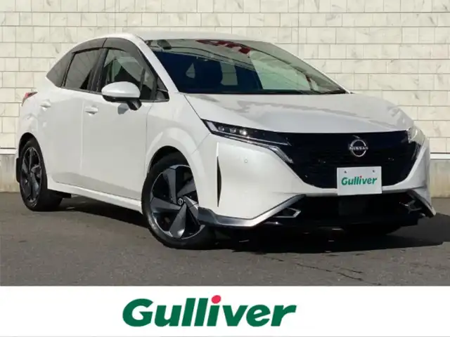 日産 オーラ G レザーエディション 岐阜県 2022(令4)年 1.5万km ピュアホワイトパール ブラインドスポットモニタ　/純正9インチナビ（フルセグ・Bluetooth・CD・DVD・USB）　全方位カメラ　/ドライブレコーダー　/デジタルインナーミラー　/ビルトインETC　/クリアランスソナー　/前席シートヒーター/純正フロアマット/ドアバイザー/ステアリングヒーター/純正17インチアルミホイール/スペアキー/保証書/取扱説明書/ナビ取扱説明書