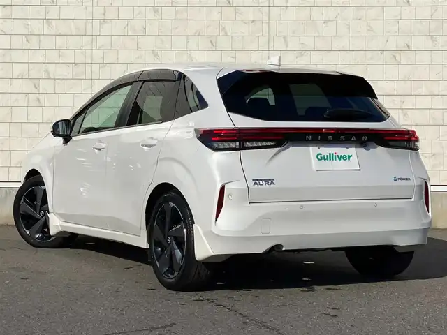 日産 オーラ G レザーエディション 岐阜県 2022(令4)年 1.5万km ピュアホワイトパール ブラインドスポットモニタ　/純正9インチナビ（フルセグ・Bluetooth・CD・DVD・USB）　全方位カメラ　/ドライブレコーダー　/デジタルインナーミラー　/ビルトインETC　/クリアランスソナー　/前席シートヒーター/純正フロアマット/ドアバイザー/ステアリングヒーター/純正17インチアルミホイール/スペアキー/保証書/取扱説明書/ナビ取扱説明書