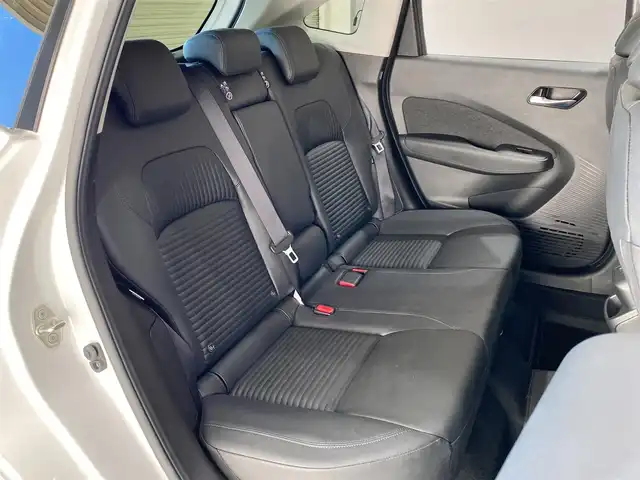 日産 オーラ G レザーエディション 岐阜県 2022(令4)年 1.5万km ピュアホワイトパール ブラインドスポットモニタ　/純正9インチナビ（フルセグ・Bluetooth・CD・DVD・USB）　全方位カメラ　/ドライブレコーダー　/デジタルインナーミラー　/ビルトインETC　/クリアランスソナー　/前席シートヒーター/純正フロアマット/ドアバイザー/ステアリングヒーター/純正17インチアルミホイール/スペアキー/保証書/取扱説明書/ナビ取扱説明書