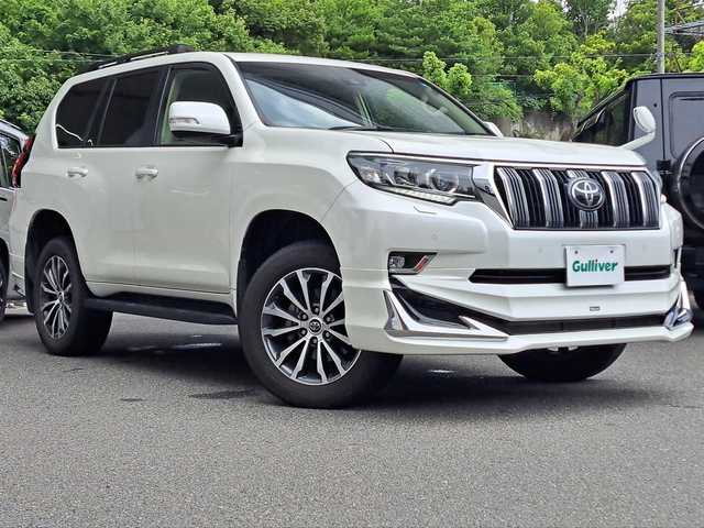 トヨタ ランドクルーザー プラド TX Lパッケージ 大阪府 2021(令3)年 2.5万km ホワイトパールクリスタルシャイン /禁煙車//モデリスタエアロ(F.R)//ムーンルーフ//オプション19インチアルミホイール//アルパイン9インチナビ/・CD・DVD・FM・AM・SD・BT・フルセグTV//ニュートラルベージュ本革シート//シートヒーター・エアシート//ルーフレールブラック//レーダークルーズコントロール//LDA//LEDヘッドライト//オートマチックハイビーム//ヘッドランプクリーナー//保証書//取扱説明書//スペアキー