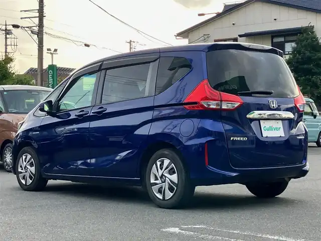 ホンダ フリード ハイブリット G ホンダセンシング 静岡県 2018(平30)年 5.7万km コバルトブルーパール ナビ装着用スペシャルパッケージ＋ETC車載器(ナビ連動)/純正ナビ（CD/DVD/BT/フルセグ）/純正ETC/バックカメラ/Honda SENSING/2列目ベンチシート（7人乗り）/タンブルシート/スライドドアイージークローザー(リア両側)/両側パワースライドドア/LEDヘッドライト＋アクティブコーナリングライト/AFS/センターテーブル/エンジンスタートボタン/パワーステアリング/パワーウィンドウ/保証書/取扱説明書/記録簿/アイドリングストップ/スマートキー/スペアキー１本/オートエアコン/クルーズコントロール/バックカメラ/三列シート/ドライブレコーダー前後/ウォークスルー/純正フロアマット/ABS/横滑り防止装置/レーンキープアシスト/オートライト/Wエアバック/衝突軽減システム