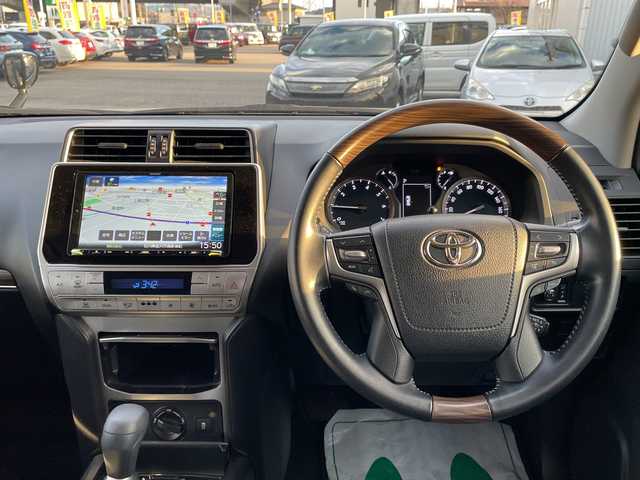 トヨタ ランドクルーザー プラド TX 石川県 2021(令3)年 1.9万km ブラック ４ＷＤ　社外９型ナビ　フルセグＴＶ　バックカメラ　ＬＥＤヘッドライト　ＥＴＣ　シートカバー　トヨタセーフティセンス　レーダークルーズ　クリアランスソナー　スペアタイヤ