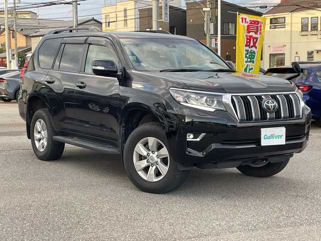 トヨタ ランドクルーザー プラド TX 石川県 2021(令3)年 1.9万km ブラック ４ＷＤ　社外９型ナビ　フルセグＴＶ　バックカメラ　ＬＥＤヘッドライト　ＥＴＣ　シートカバー　トヨタセーフティセンス　レーダークルーズ　クリアランスソナー　スペアタイヤ