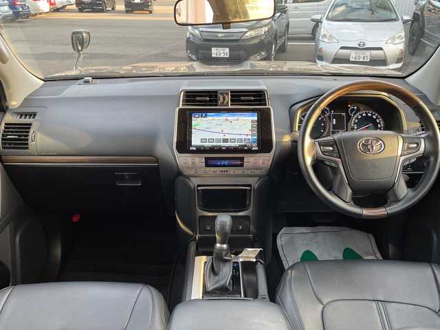 トヨタ ランドクルーザー プラド TX 石川県 2021(令3)年 1.9万km ブラック ４ＷＤ　社外９型ナビ　フルセグＴＶ　バックカメラ　ＬＥＤヘッドライト　ＥＴＣ　シートカバー　トヨタセーフティセンス　レーダークルーズ　クリアランスソナー　スペアタイヤ