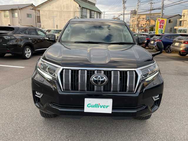 トヨタ ランドクルーザー プラド TX 石川県 2021(令3)年 1.9万km ブラック ４ＷＤ　社外９型ナビ　フルセグＴＶ　バックカメラ　ＬＥＤヘッドライト　ＥＴＣ　シートカバー　トヨタセーフティセンス　レーダークルーズ　クリアランスソナー　スペアタイヤ
