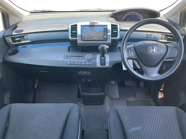 ホンダ フリード Gエアロ ジャストセレクション 鳥取県 2012(平24)年 5.6万km プレミアムブラキッシュパール ワンオーナー/純正ナビ／ＴＶ／ＤＶＤ／ＣＤ/バックカメラ/ビルトインＥＴＣ/純正エアロパーツ/片側パワースライド/スマートキー/キセノンライト/純正アルミホイール/ウィンカーミラー/電動格納ミラー/２列目キャプテンシート/フロアマット/ドアバイザー/スペアキーｘ１