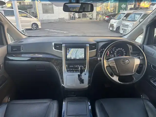 トヨタ ヴェルファイア 2．4Z Gエディション 愛知県 2013(平25)年 12.2万km ホワイトパールクリスタルシャイン ワンオーナー/4WD/両側パワースライドドア/純正フリップダウンモニター/純正HDDナビ(ワンセグ/BT/BD/DVD/CD/USB/ラジオ）/バックカメラ/ETC/クルーズコントロール/ABS/横滑り防止装置/盗難防止装置/オートライト/前後コーナーセンサー/シートポジションメモリー/レザーシート/パワーシート/シートヒーター/チップアップシート/オットマン/純正フロアマット/純正アルミホイール/パワーステアリング/パワーウィンドウ/ドアバイザー/フォグランプ/スマートキー/スペアキー/保証書/取扱説明書