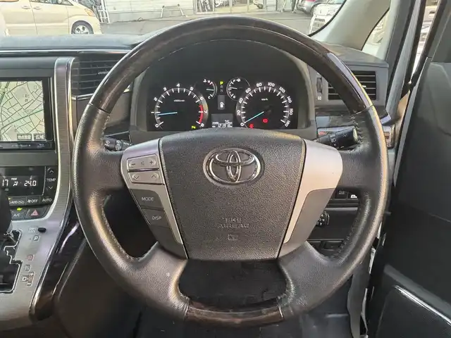 トヨタ ヴェルファイア 2．4Z Gエディション 愛知県 2013(平25)年 12.2万km ホワイトパールクリスタルシャイン ワンオーナー/4WD/両側パワースライドドア/純正フリップダウンモニター/純正HDDナビ(ワンセグ/BT/BD/DVD/CD/USB/ラジオ）/バックカメラ/ETC/クルーズコントロール/ABS/横滑り防止装置/盗難防止装置/オートライト/前後コーナーセンサー/シートポジションメモリー/レザーシート/パワーシート/シートヒーター/チップアップシート/オットマン/純正フロアマット/純正アルミホイール/パワーステアリング/パワーウィンドウ/ドアバイザー/フォグランプ/スマートキー/スペアキー/保証書/取扱説明書