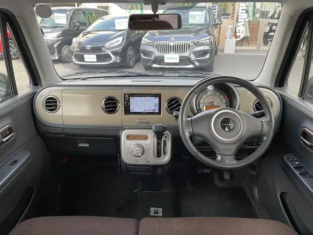 スズキ ラパン XL 岡山県 2013(平25)年 5.4万km アーバンブラウンパールメタリック 登録時走行距離53414km/社外SDナビ/(AM/FM/DISC/TV)/バックカメラ/D席シートヒーター/アイドリングストップ/プッシュスタート/スマートキー/純正14インチアルミホイール/パワーステアリング/パワーウィンドウ/保証書/記録簿/取扱説明書/ハロゲンヘッドライト