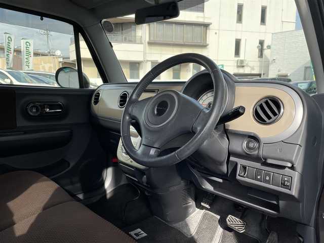 スズキ ラパン XL 岡山県 2013(平25)年 5.4万km アーバンブラウンパールメタリック 登録時走行距離53414km/社外SDナビ/(AM/FM/DISC/TV)/バックカメラ/D席シートヒーター/アイドリングストップ/プッシュスタート/スマートキー/純正14インチアルミホイール/パワーステアリング/パワーウィンドウ/保証書/記録簿/取扱説明書/ハロゲンヘッドライト